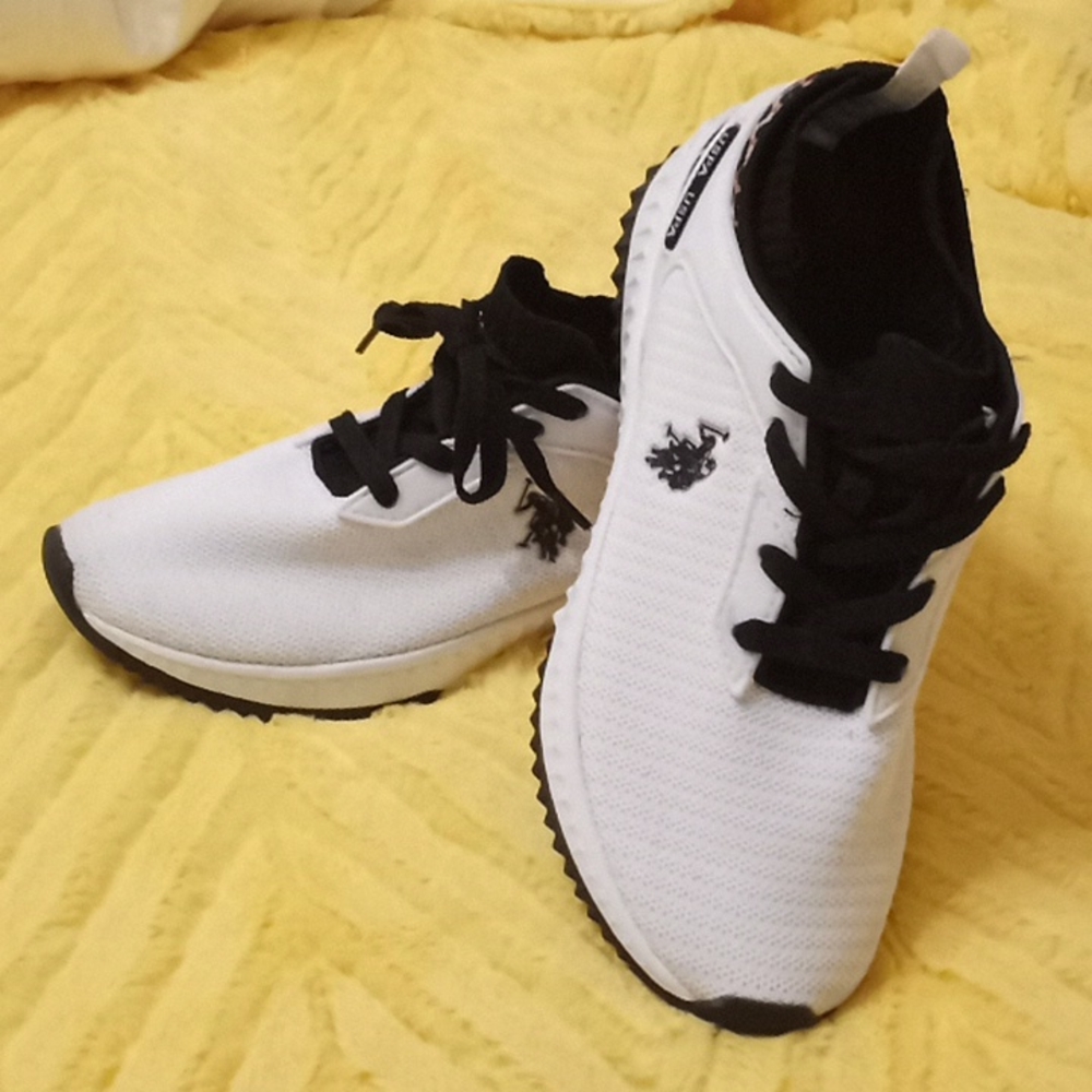 Polo tennis shoes...size 8.5 lepard trim on back of heel